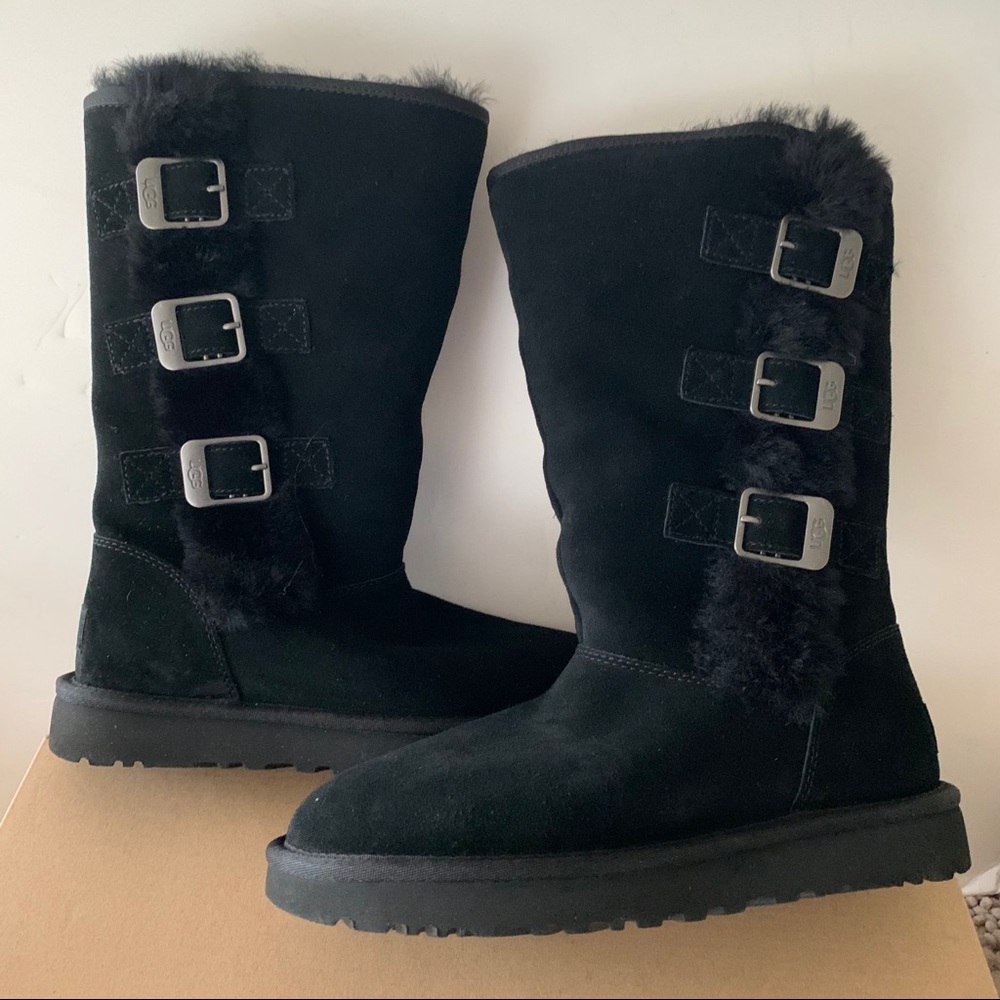 Ugg Klea genuine lamb fur tall black boot with buckle sides. NIB